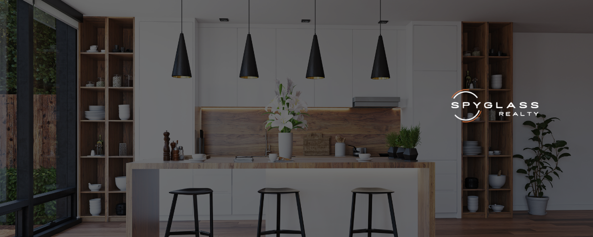 kitchen with white cabinets and pendant lights